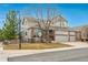 Well-maintained two-story home with a three-car garage and a charming fence at 7506 Chipmunk Pl, Littleton, CO 80125