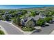 Aerial view of a beautiful single-Gathering home with well-manicured landscaping in a suburban neighborhood at 7506 Chipmunk Pl, Littleton, CO 80125