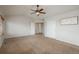 Spacious main bedroom features neutral tones, ceiling fan, large closet, and a tasteful decor at 7506 Chipmunk Pl, Littleton, CO 80125