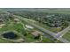 Wide aerial view showcasing park featuring green space, walking trails, ponds, and play areas at 7506 Chipmunk Pl, Littleton, CO 80125