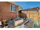 Well-maintained backyard featuring raised garden beds filled with plants and gravel for easy maintenance at 6925 W 27Th Ave, Wheat Ridge, CO 80033
