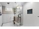 Beautiful bathroom featuring a glass shower, modern fixtures, and stylish vanity at 6925 W 27Th Ave, Wheat Ridge, CO 80033