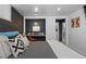 Stylish bedroom featuring a built-in desk, modern decor, and comfortable furnishings at 6925 W 27Th Ave, Wheat Ridge, CO 80033