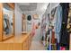 Spacious walk-in closet with custom shelving, ample storage, and decorative accents at 6925 W 27Th Ave, Wheat Ridge, CO 80033