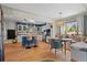 Stylish eat-in kitchen with a large island, modern appliances, and a cozy breakfast nook at 6925 W 27Th Ave, Wheat Ridge, CO 80033
