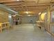 Large unfinished basement with exposed beams, ideal for future expansion and projects at 20380 Silver Horn Ln, Monument, CO 80132