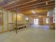 Unfinished basement offers ample storage and workspace, ready for customization at 20380 Silver Horn Ln, Monument, CO 80132