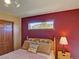 Comfortable bedroom with a window view and plenty of natural light at 20380 Silver Horn Ln, Monument, CO 80132