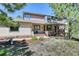Charming two-story home with a covered front porch and well-maintained landscaping at 20380 Silver Horn Ln, Monument, CO 80132