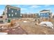 Well-maintained community garden with raised beds and walking paths, offering residents a place to grow their own produce at 9369 Longs Peak Dr, Henderson, CO 80640
