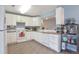 Functional kitchen layout with ample counter space, abundant cabinets, and modern fixtures at 9369 Longs Peak Dr, Henderson, CO 80640