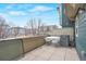 Private patio with outdoor seating and a view of the surrounding neighborhood, perfect for enjoying the outdoors at 9369 Longs Peak Dr, Henderson, CO 80640