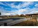 Exterior view of the community pool area, featuring a covered pool and an outdoor structure at 22405 E Plymouth Cir, Aurora, CO 80016