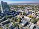 Detailed aerial of the city, highlighting residential buildings surrounded by mature trees at 33 N Corona St # 205, Denver, CO 80218