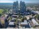 Areal of residential towers surrounded by mature trees at 33 N Corona St # 205, Denver, CO 80218