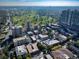 Wide aerial showcasing greenery and urban buildings, situated near a golf course in the city at 33 N Corona St # 205, Denver, CO 80218
