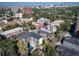An aerial view displays the neighborhood, including residential buildings and a community pool at 33 N Corona St # 205, Denver, CO 80218