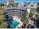 Aerial shot showcasing an apartment building with pool and balconies at 33 N Corona St # 205, Denver, CO 80218