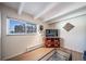 Living room featuring beams, a large window, and stylish decor at 33 N Corona St # 205, Denver, CO 80218
