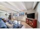 Spacious living room boasts hardwood floors, natural light, and contemporary decor, providing a comfortable living space at 33 N Corona St # 205, Denver, CO 80218