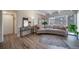 Bright living room with a comfortable sofa, hardwood floors, and plenty of natural light at 33 N Corona St # 205, Denver, CO 80218