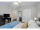 A comfortable bedroom features a mirrored closet, providing style and functionality to the space at 2347 Switch Grass Way, Castle Rock, CO 80109