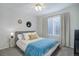 Bedroom featuring a cozy bed, neutral walls, and a well-lit window, creating a relaxing atmosphere at 2347 Switch Grass Way, Castle Rock, CO 80109