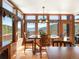 Dining room with mountain views and wooden table at 76 Raven Ridge Rd, Idaho Springs, CO 80452