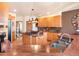 Spacious kitchen with wood cabinets, kitchen island, and stainless steel appliances at 76 Raven Ridge Rd, Idaho Springs, CO 80452