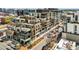 Stunning aerial view showcases the building's architecture, surrounding cityscape, and prime location at 250 Columbine St # 310, Denver, CO 80206