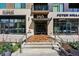 Inviting building entrance with well-maintained landscaping and clear signage, address 250 at 250 Columbine St # 310, Denver, CO 80206
