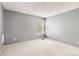 Neutral bedroom with a carpeted floor and a window at 2141 Weatherstone Cir, Highlands Ranch, CO 80126
