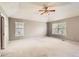 Spacious bedroom featuring a vaulted ceiling, ceiling fan, and neutral paint at 2141 Weatherstone Cir, Highlands Ranch, CO 80126