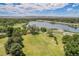 Aerial view of lake, park, and city at 3047 W 47Th Ave # 109, Denver, CO 80211
