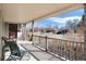 Covered front porch with seating offering an inviting outdoor living space at 2307 Moline St, Aurora, CO 80010