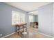 Bedroom with desk and mirrored closet at 12423 E Louisiana Ave, Aurora, CO 80012