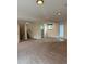 Finished basement boasts plush carpeting, neutral paint, and multiple access points at 3566 E Fair Pl, Centennial, CO 80121