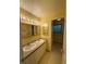 Clean and bright bathroom with dual sinks, vanity lighting, and a neutral color scheme at 3566 E Fair Pl, Centennial, CO 80121