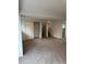 Spacious bedroom features a walk-in closet and stairs to another level at 3566 E Fair Pl, Centennial, CO 80121