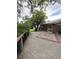 Well-maintained deck features patterned inlays, offering a stylish outdoor living space with railing at 3566 E Fair Pl, Centennial, CO 80121