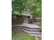 Multi-tiered deck with stairs, ideal for outdoor dining and relaxation, and access to the house at 3566 E Fair Pl, Centennial, CO 80121