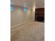 Cozy living room with a brick fireplace, carpeting, and natural light at 3566 E Fair Pl, Centennial, CO 80121
