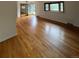 Open concept room with natural light and hardwood floors at 3566 E Fair Pl, Centennial, CO 80121