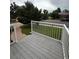 View from the front porch. The light colored deck creates an inviting curb appeal at 3566 E Fair Pl, Centennial, CO 80121