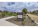 Periwinkle Park with walking path and community rules sign at 6233 N Liverpool St, Aurora, CO 80019