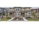 Attractive home exterior with stone accents, neutral siding, and a well-maintained lawn at 6233 N Liverpool St, Aurora, CO 80019