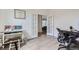 Bright office space with French doors and neutral decor is ideal for work or study with lots of natural light at 6233 N Liverpool St, Aurora, CO 80019