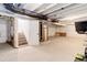 Unfinished basement showing the entrance, exposed ceiling with piping, and concrete flooring at 431 Courtfield Way, Castle Pines, CO 80108