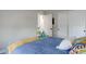 This well-lit bedroom includes large windows, modern decor, and soft carpet at 431 Courtfield Way, Castle Pines, CO 80108