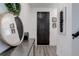 Welcoming entryway with stylish mirror, console table, and decorative artwork at 431 Courtfield Way, Castle Pines, CO 80108